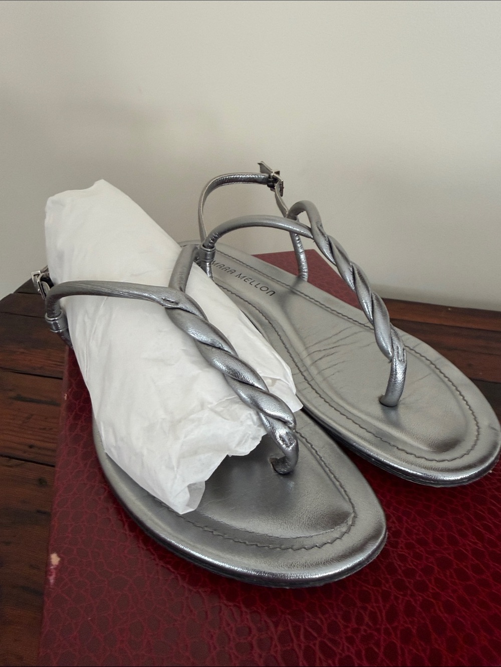 Tamara Mellon Metallic Leather Silver Twisted T-Strap Sandals.  Size 38.